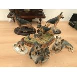 A quantity of German shepherd figures