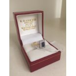 An 18ct diamond & sapphire dress ring