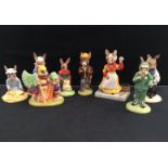 Eight Royal Doulton Bunnykins figures: 'Sir Gawain', 'Stop Watch', 'Will Scarlett', 'Vicar',