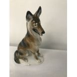 A rare 1950s Rosenthal figure of a german shepherd seated