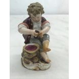 A 19th century Meissen figure of a wine maker,