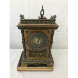 A 19th century brass mantle clock