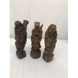 Oriental carved wooden immortals