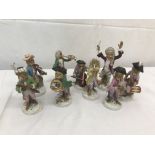 An unmarked nine piece monkey band