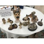 A quantity of Country Artists figures of german shepherds