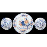 Chinese Imari charger and two plates 18th century The charger with floral motif and gilt details (D