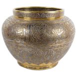 A Persian brass and silver bowl 18th/19th century Elegantly decorated with Arabic calligraphy and