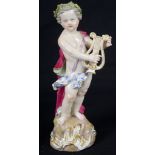 A 19th Century Meissen Figure of Bacchus Playing the Harp: Blue crossed sword mark to base,