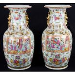 A pair of Canton famille rose vases 19th century Vividly decorated with medallions of ladies and