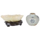 A Chinese quartz brush washer 19th century Of a celadon tone with faint brown inclusions.