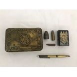 A Princess Mary tin with bullets,