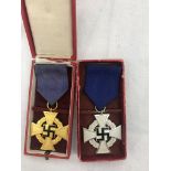 Two cased WWII German Long Service awards: 25 and 40 years