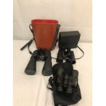 Three pairs of cased binoculars