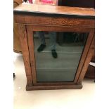 A 19th century walnut pier cabinet with brass mounts & fittings