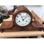 A mahogany mantel clock