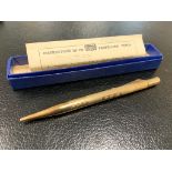 A 9ct gold propelling pencil