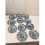 A collection of 11 Chinese blue and white plates to inc 18th century examples & three Kangxi