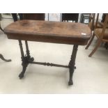 A 19th century walnut card table