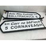 A pair of enamel Irish street signs