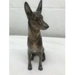 A Rosenthal figure of a seated German Shepherd