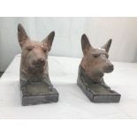 A pair of Art Deco bookends in the form of German Shepherds,