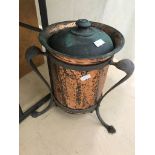 An Arts & Crafts copper coal scuttle