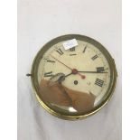 A brass 19th century ship's clock