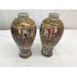 A pair of 19th century Chinese famille rose mandarin vases