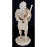 A Japanese ivory okimono Meiji period Carved as an old peasant holding a stick and carrying a