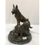 A spelter figure of a pair of German Shepherds,