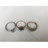 Three 9ct dress rings (one missing a stone).