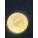 A Kenyan gold 1966 100 shilling
