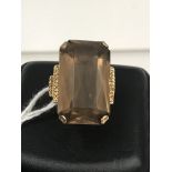 A 9ct smokey quartz dress ring