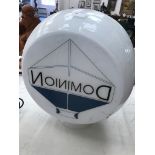 A Dominian petrol pump globe