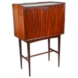 A Drinks Cabinet: Circa 1960s, rosewood & rosewood veneer, opening to reveal a fitted shelf,