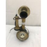 A brass stick telephone