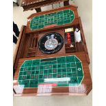 A roulette/games table in the adams tyle