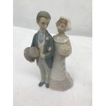 A Lladro bride and groom