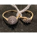 Two diamond cluster rings