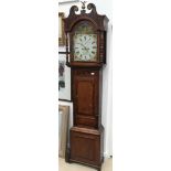 An early 19th century mahogany longcase clock the face handpainted with a mill & figures the dial