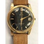 A gentleman's Omega black dial Seamaster automatic calendar watch