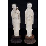 Two Chinese ivory carvings 19th century Carved in the shape of two standing ladies playing musical
