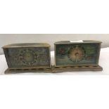 A pair of enamel wind-up clocks,