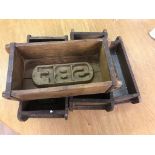 Five wooden brick moulds