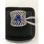 An Effy 14k diamond and tanzanite dress ring: 0.87 total diamond weight and 2.