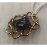 A 9ct gold abstract high quality black opal brooch