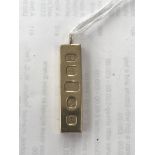 A 9ct gold 1977 ingot pendant