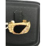 A 9ct gold diamond & onyx ring