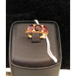 A 9ct garnet dress ring