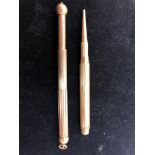 A 9ct gold Samson Morden pencil;